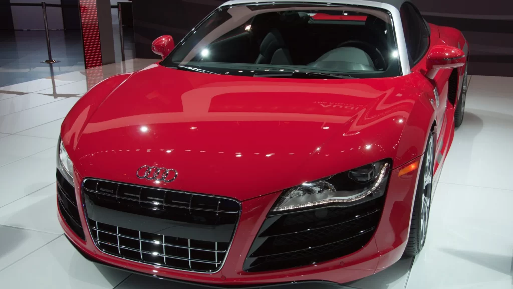 car red Audi luxury sports showroom