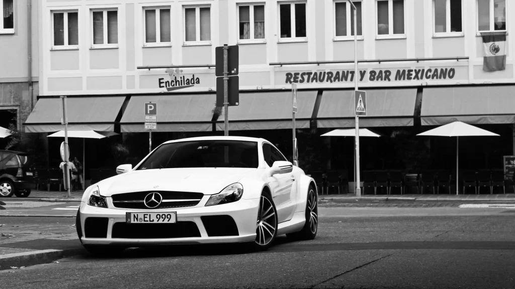 car restaurant street building parking license plate