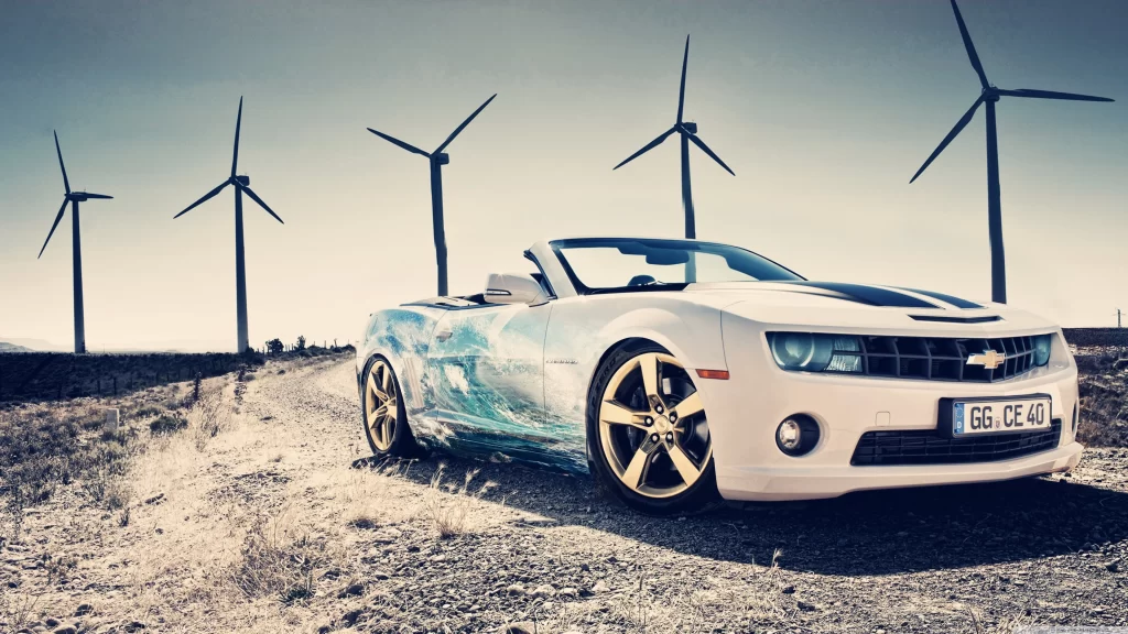 car wind turbines desert road sky wheels license plate environment