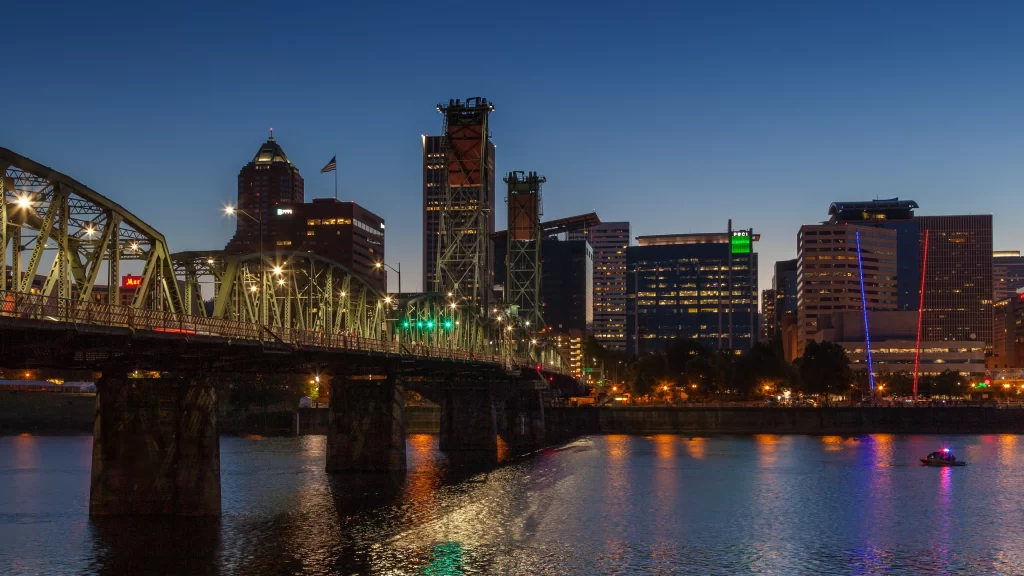 cityscape bridge river skyline lights evening