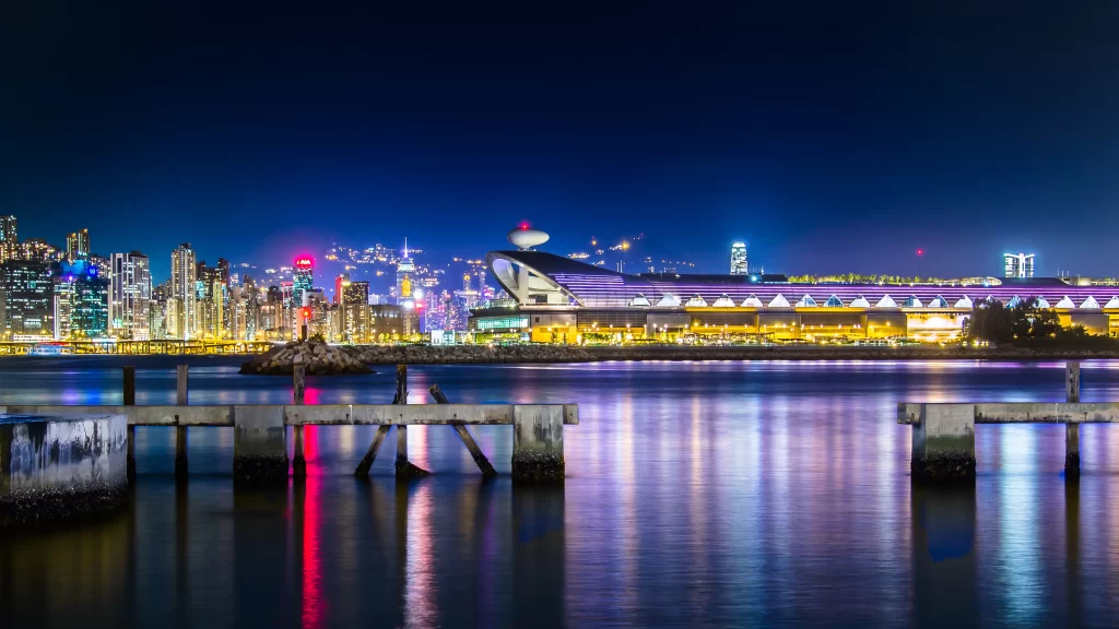 cityscape night lights water reflection skyline