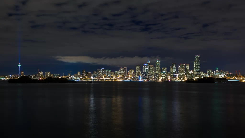 cityscape night skyline lights water reflection