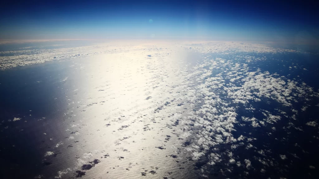 clouds sky sunlight ocean horizon reflection blue white