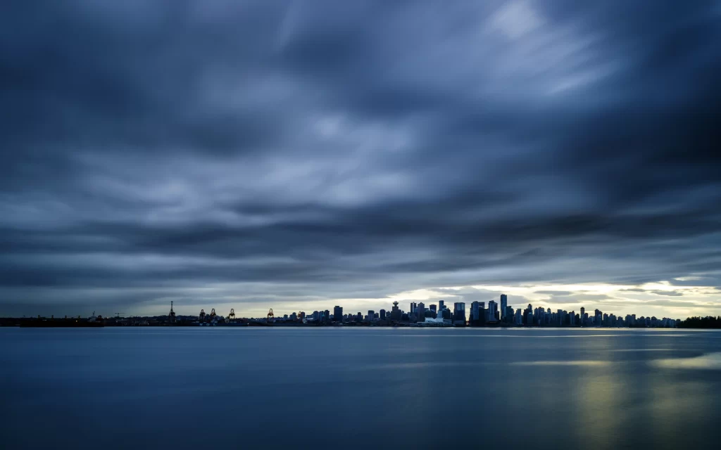 cloudy sky cityscape water reflection sunset urban tranquil