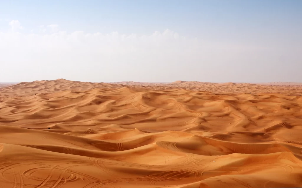 desert sand dunes clear sky vast landscape