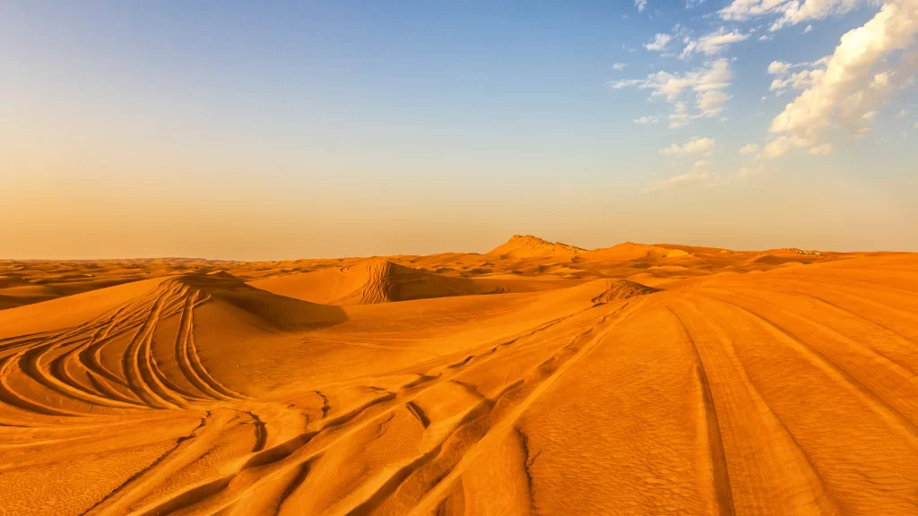 desert sand dunes landscape sky clouds