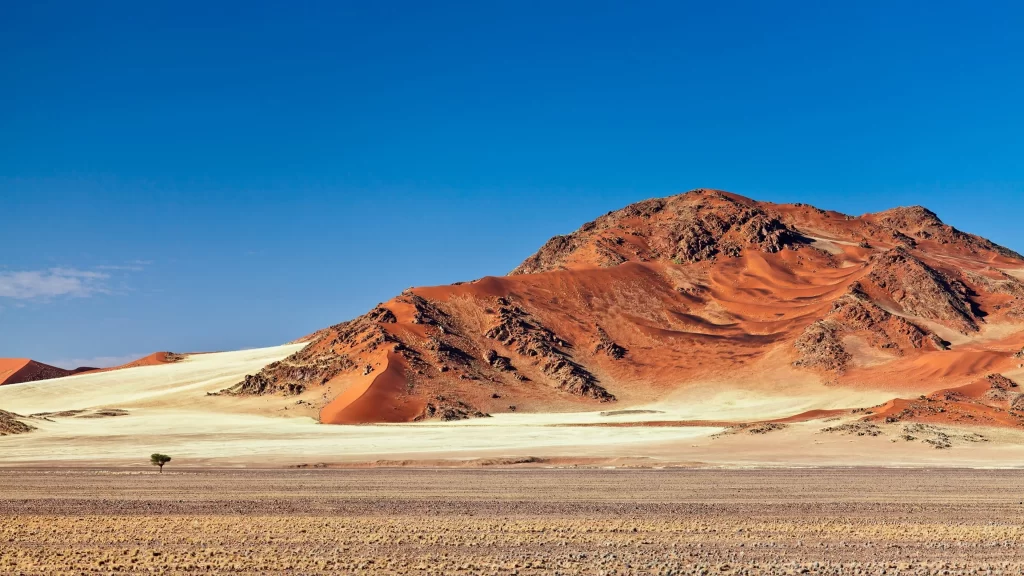desert sand dunes mountain clear sky