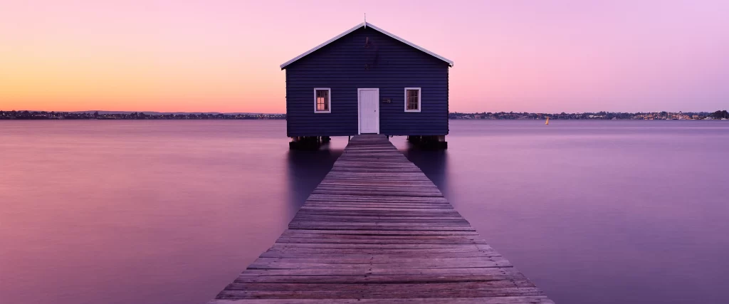 dock house water sunset calm