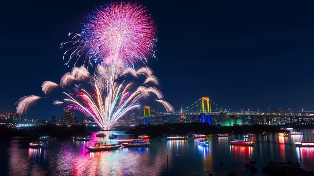 fireworks night bridge water boats cityscape celebration reflection