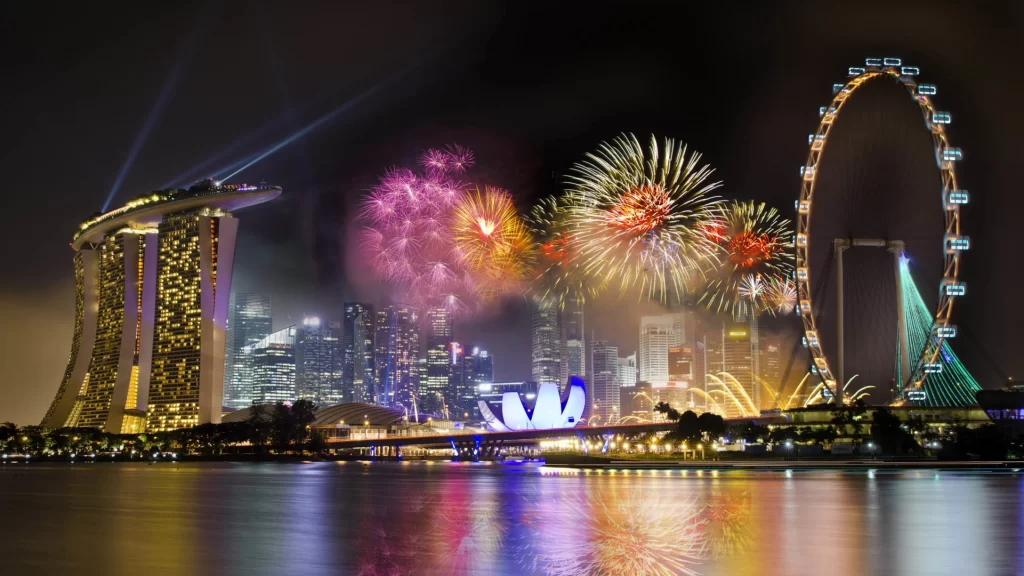 fireworks night cityscape reflection lights celebration