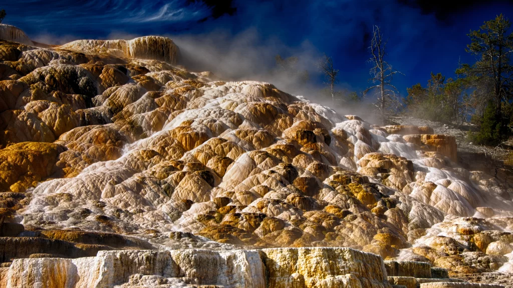 geothermal steam natural wonder rocky terrain mineral deposits