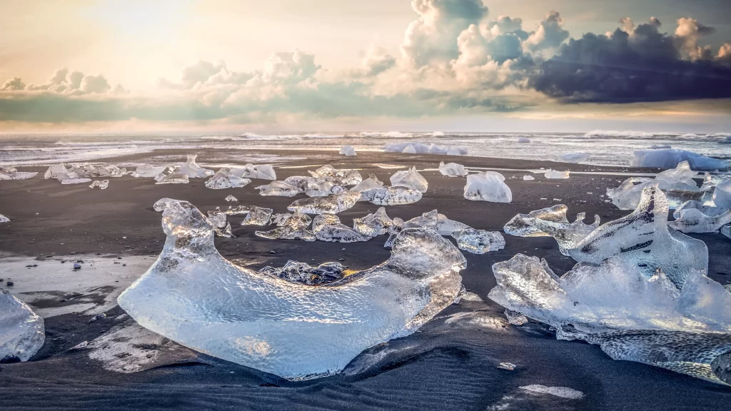 ice beach clouds sunlight landscape nature