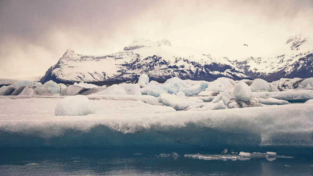 ice snow mountains clouds water landscape