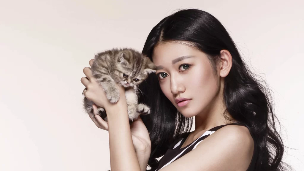 kitten, woman, black hair, white background, black white clothing