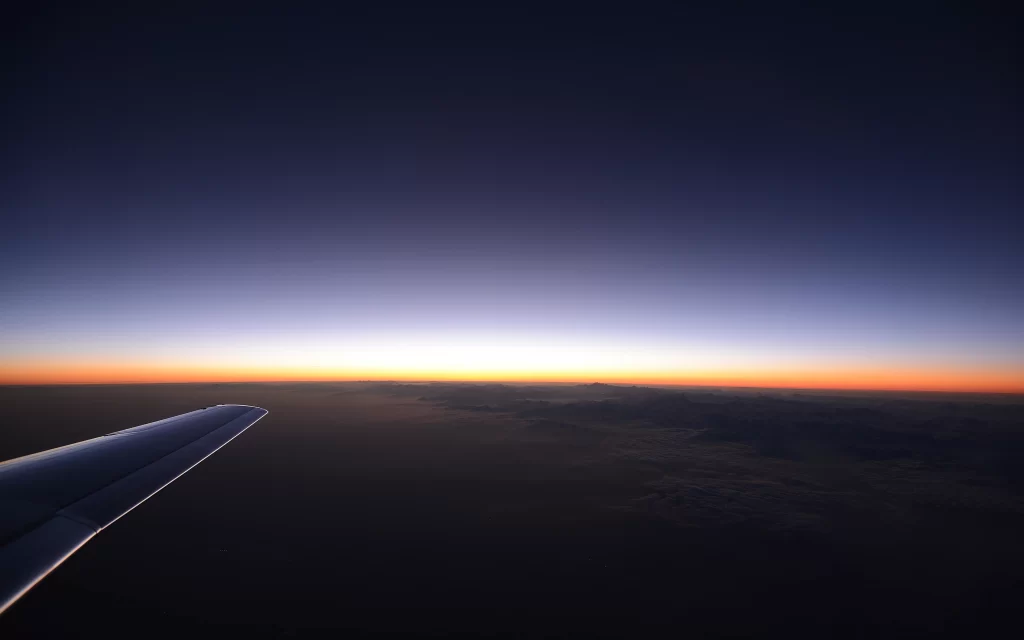 Sunset Horizon Airplane Wing Clouds Mountains