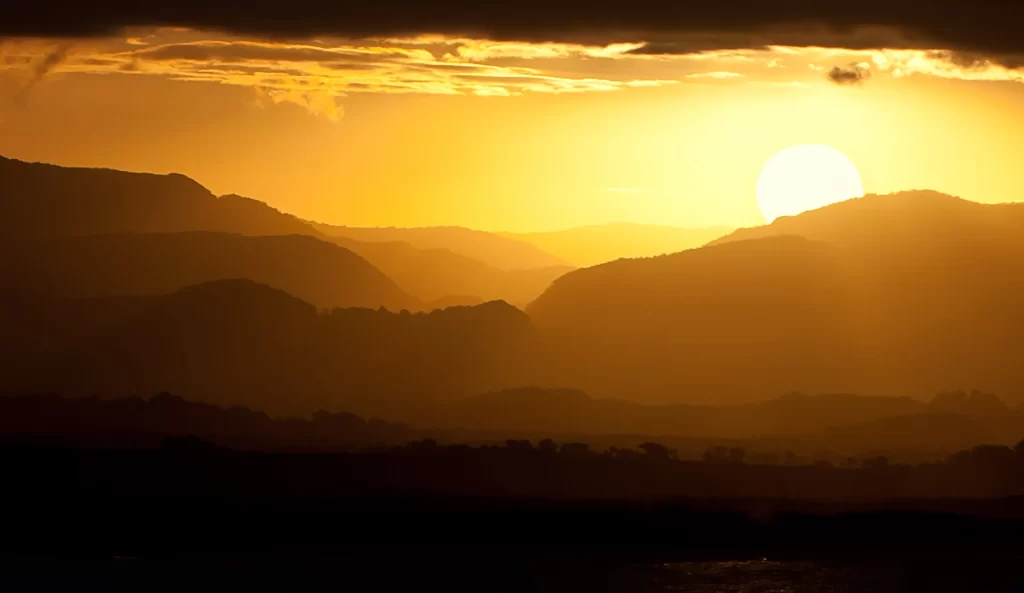 Sunset Mountain Range Golden Light Clouds Silhouette
