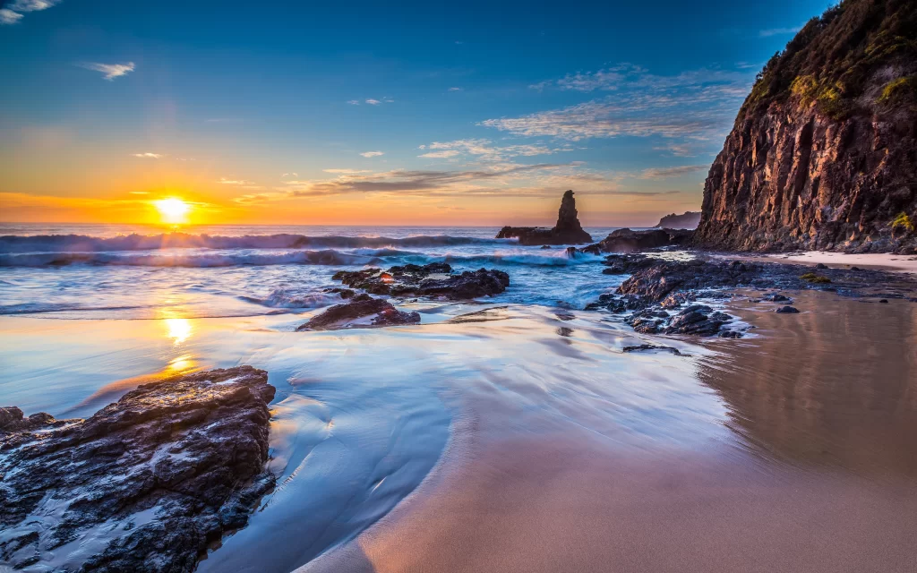 Sunset Ocean Waves Rocky Shoreline Sandy Beach Cliff