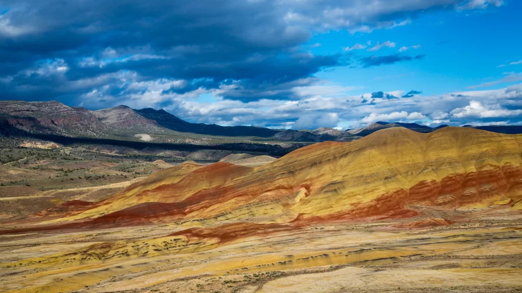landscape desert mountains sky clouds colors