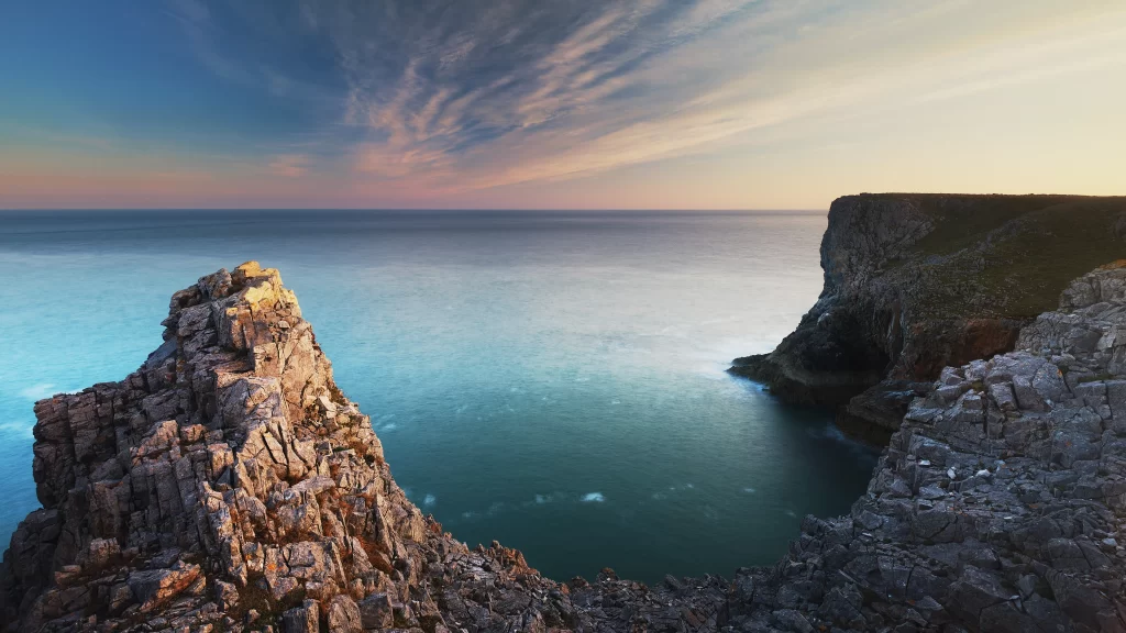 landscape ocean cliffs sunset clouds horizon