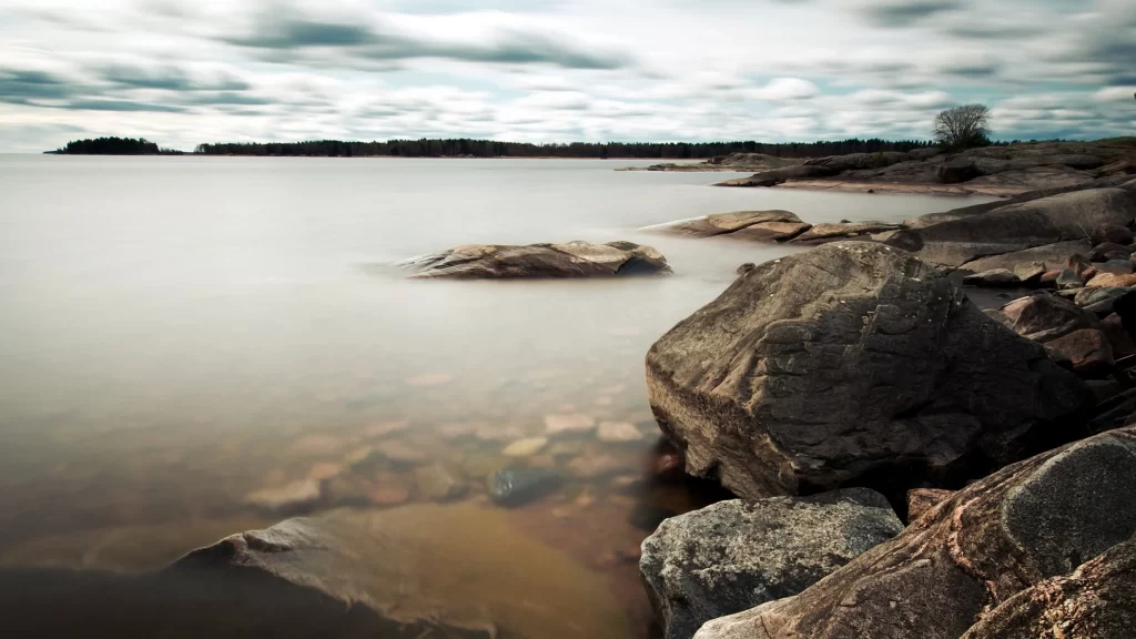 landscape water rocks sky clouds nature