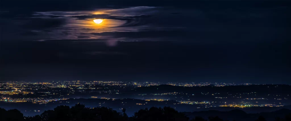 moon night city lights clouds landscape