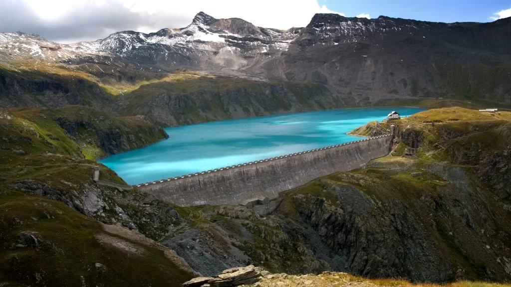 mountain lake dam water blue sky