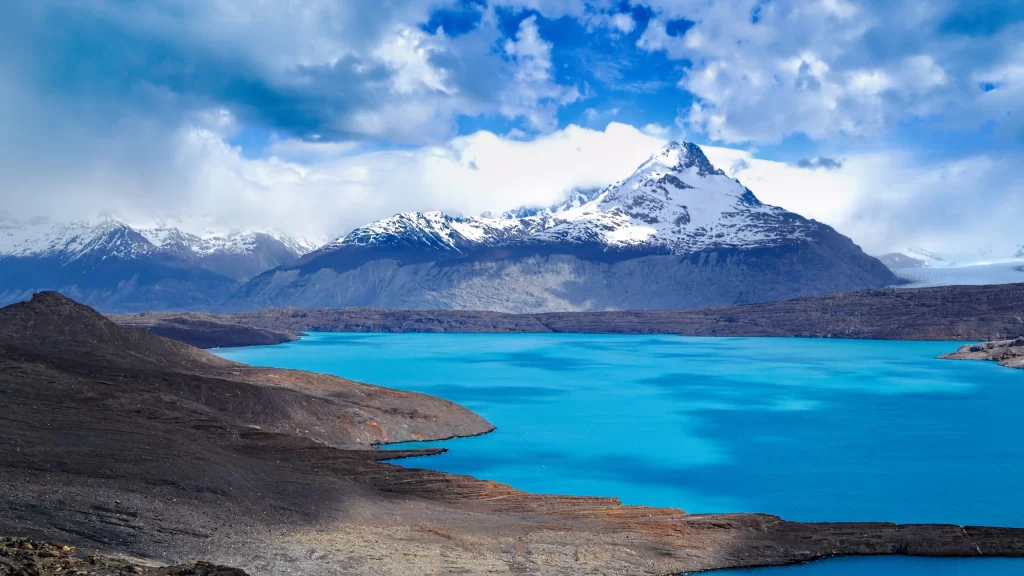 mountain lake snow sky blue