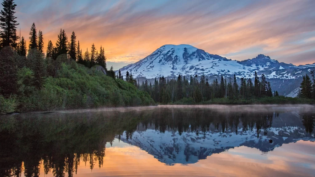 mountain lake sunset reflection forest snow