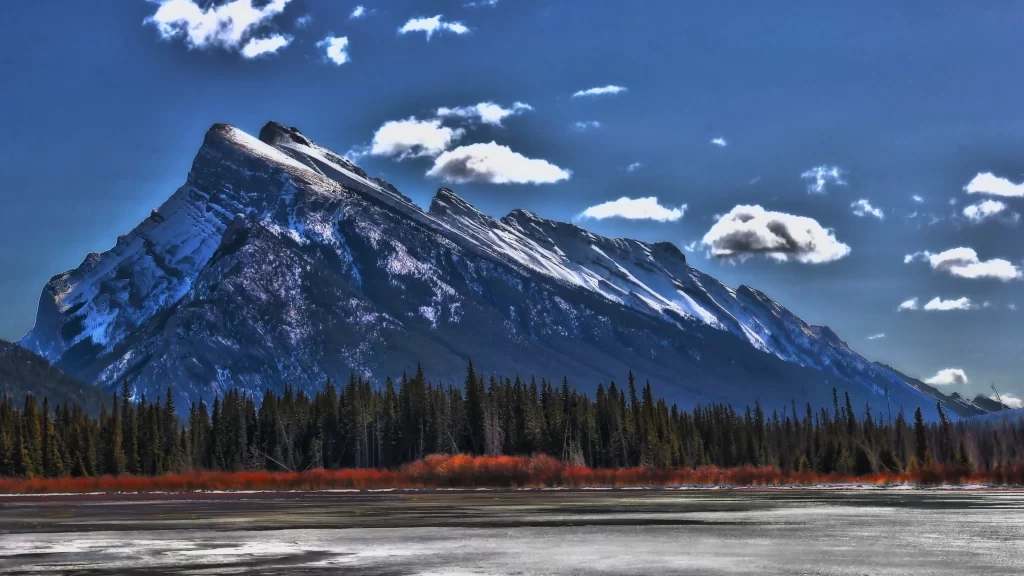 mountain snow sky forest lake