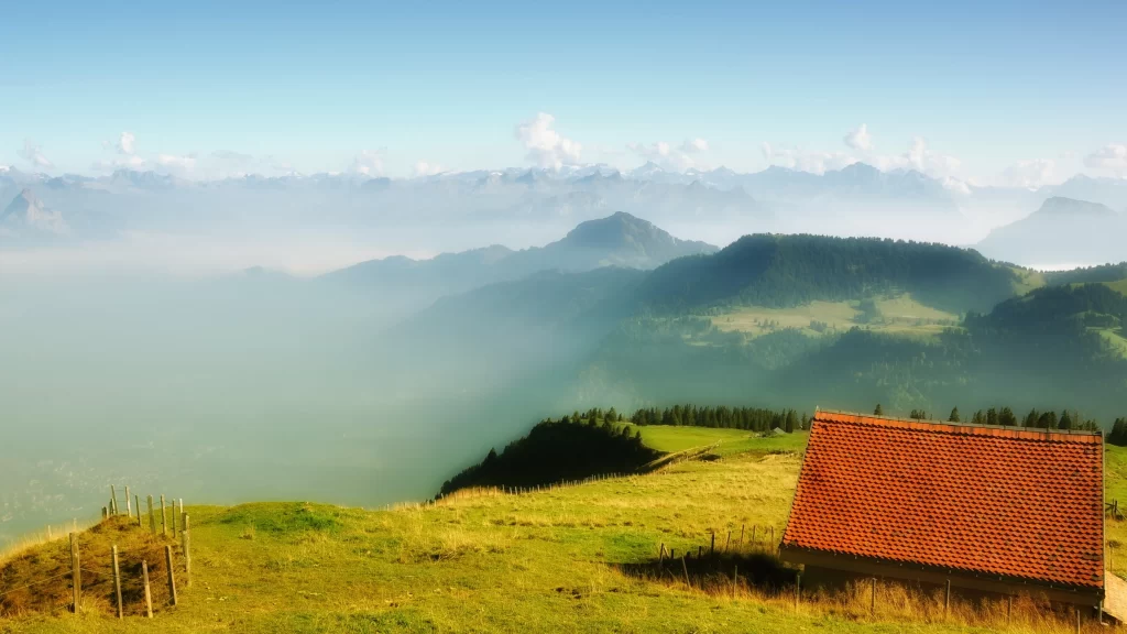 mountains greenery house clouds sky landscape