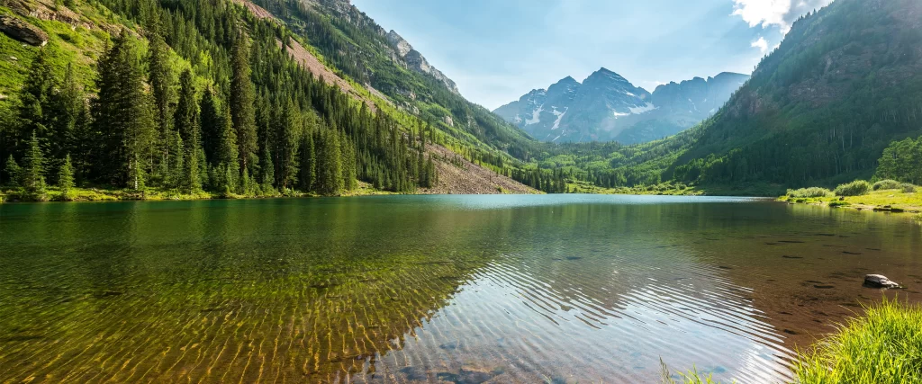mountains lake forest green clear sky