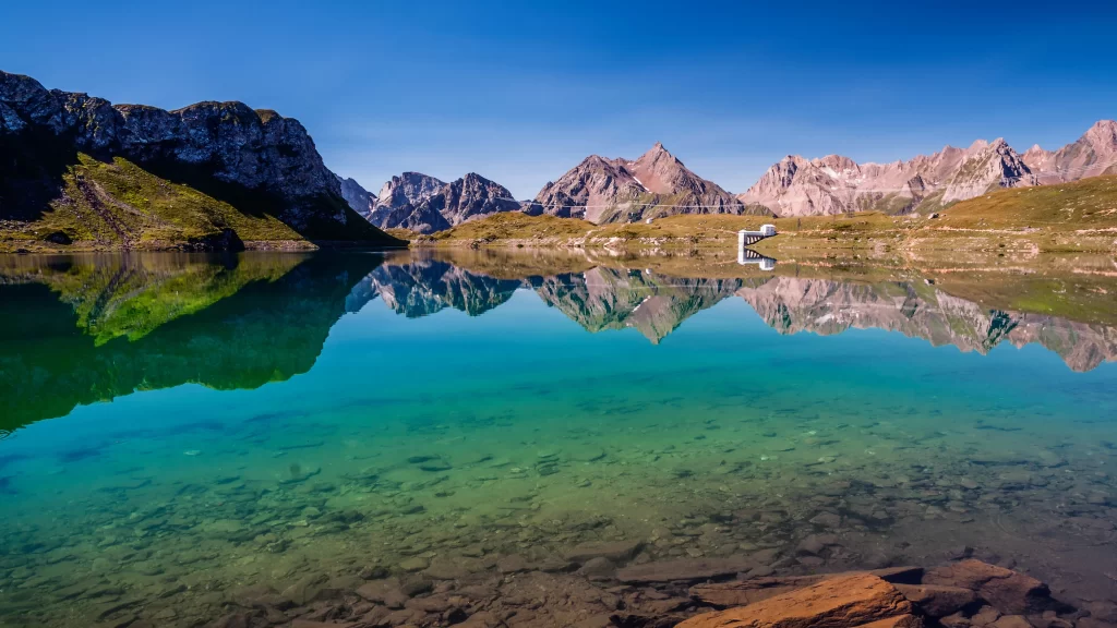 mountains lake reflection clear sky nature