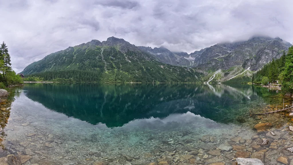 mountains lake reflection sky clouds
