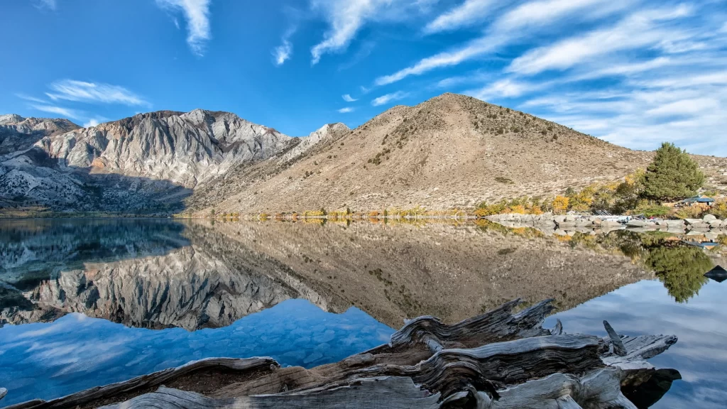 mountains lake reflection sky clouds