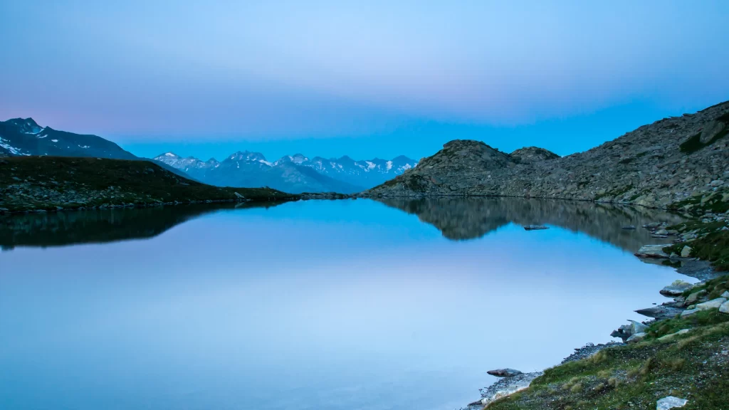 mountains lake reflection sky twilight serene