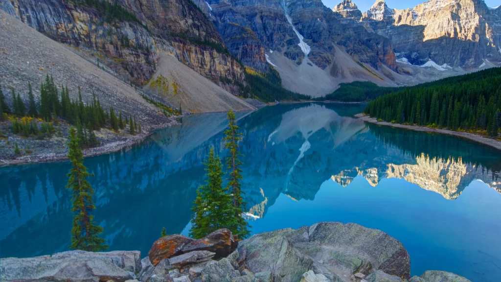 mountains lake reflection trees rocks