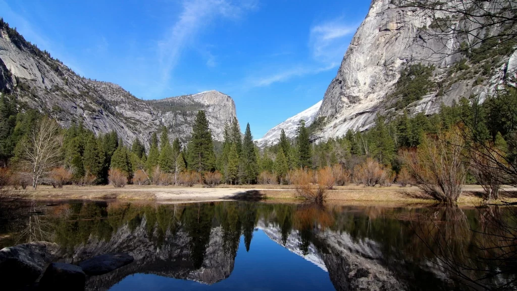 mountains lake reflection trees sky clouds