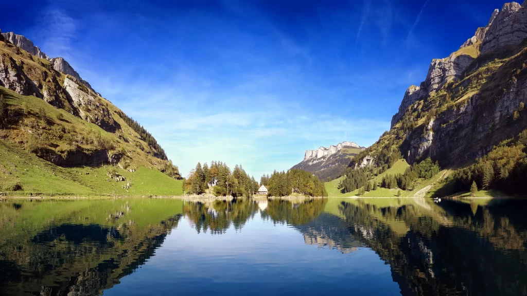 mountains lake sky reflection trees