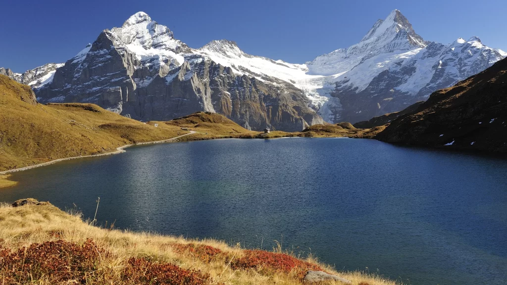 mountains lake snow clear sky