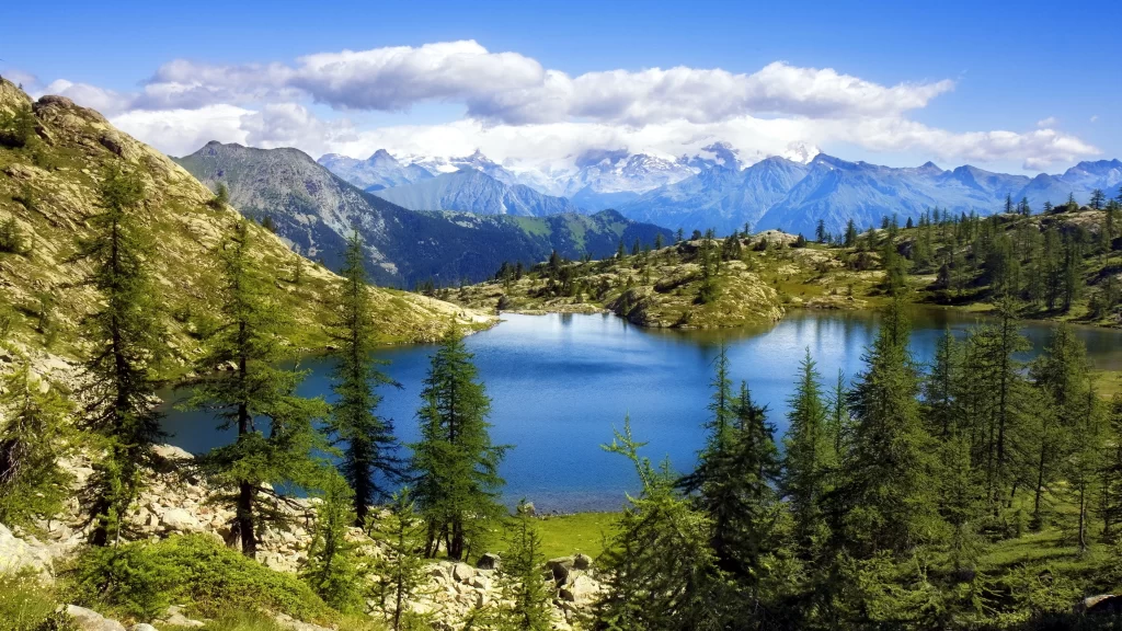 mountains lake trees sky clouds