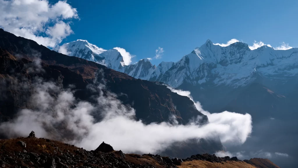 mountains snow clouds sky landscape