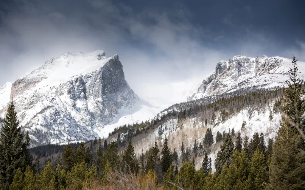 mountains snow clouds trees sky