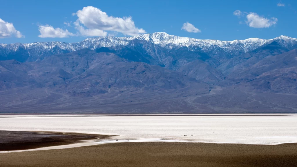 mountains snow desert landscape sky clouds