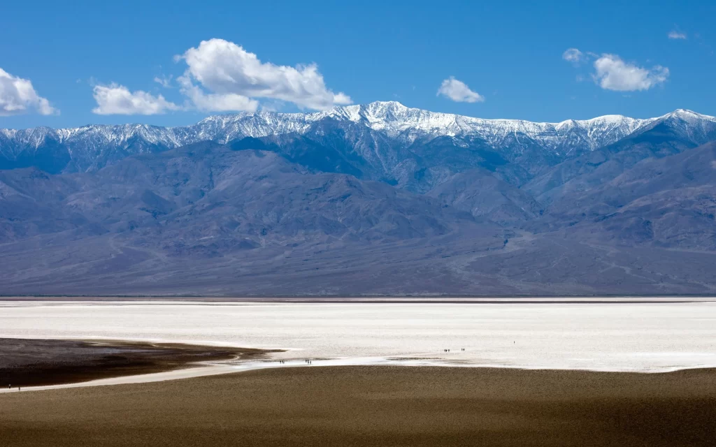 mountains snow desert landscape sky clouds
