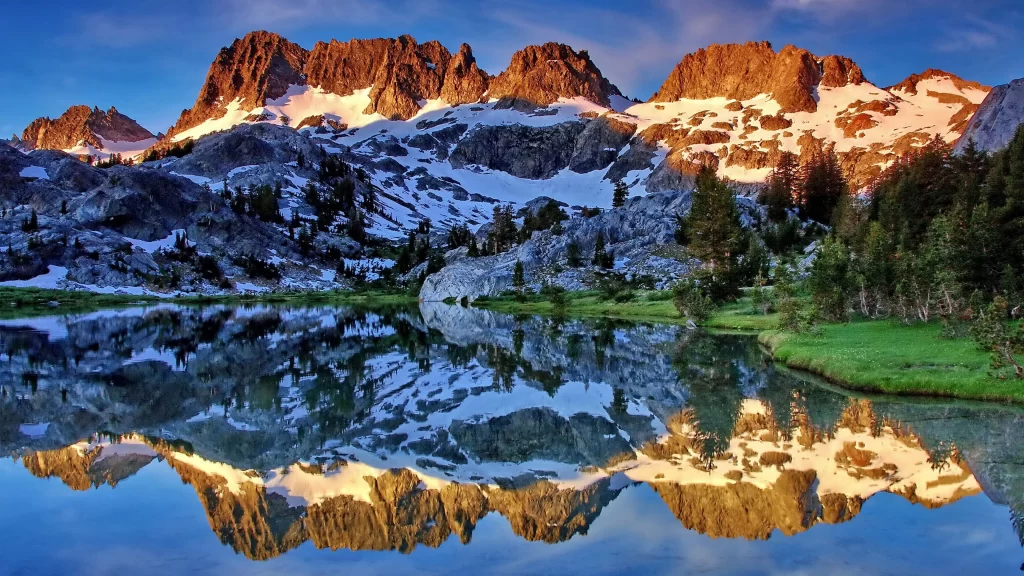 mountains snow lake reflection trees sky