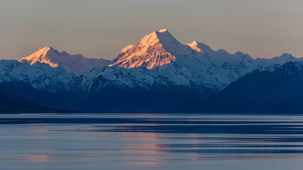mountains snow sunrise lake reflection tranquil
