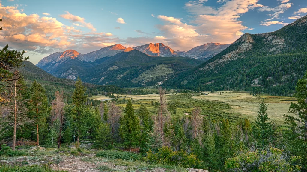 mountains valley trees sunset clouds landscape