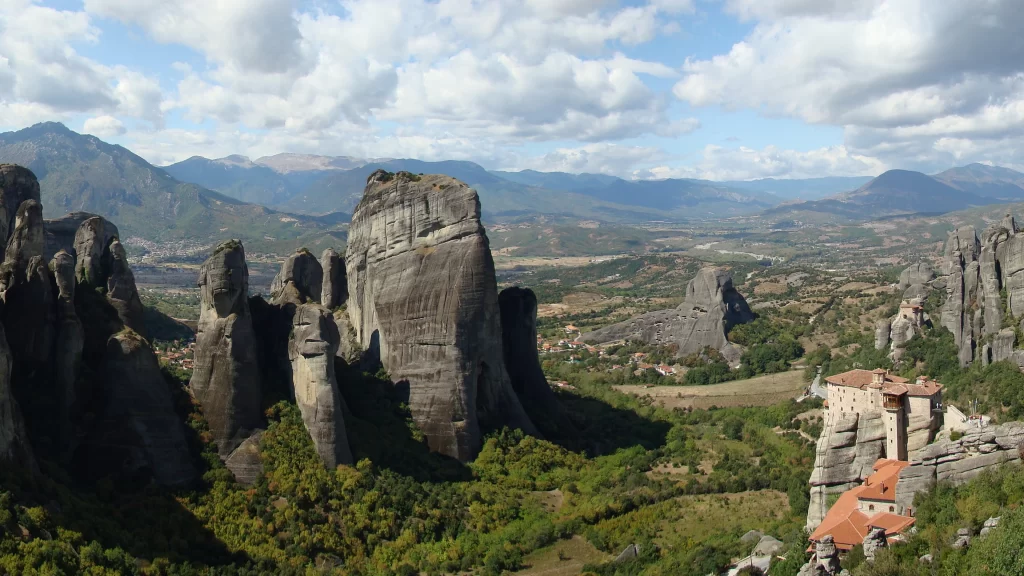 mountains valleys clouds monastery