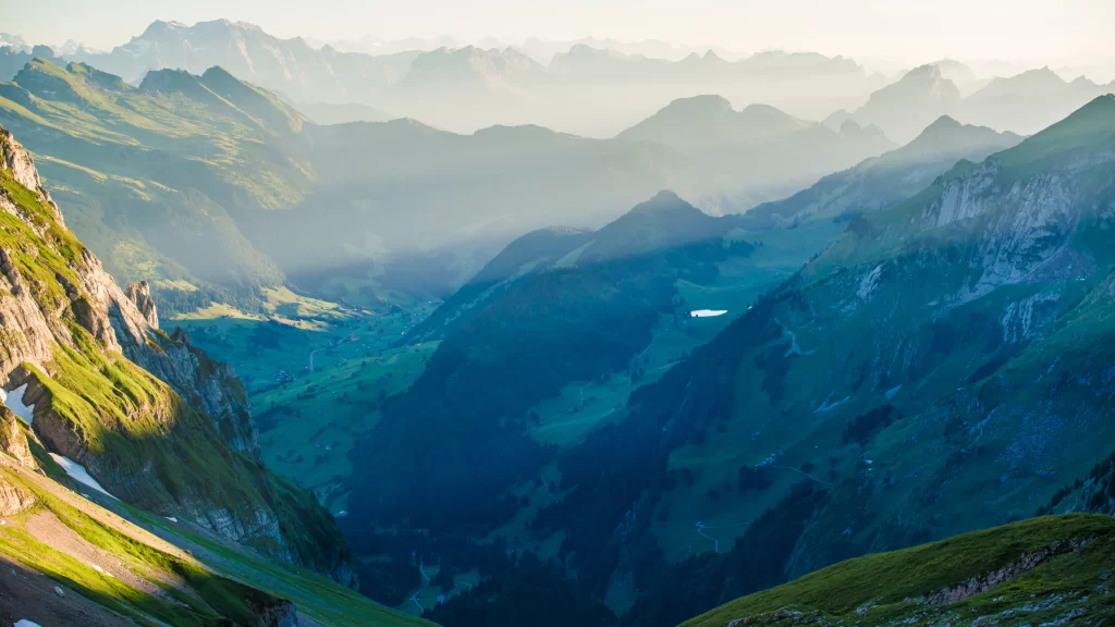 mountains valleys sunlight greenery landscape nature