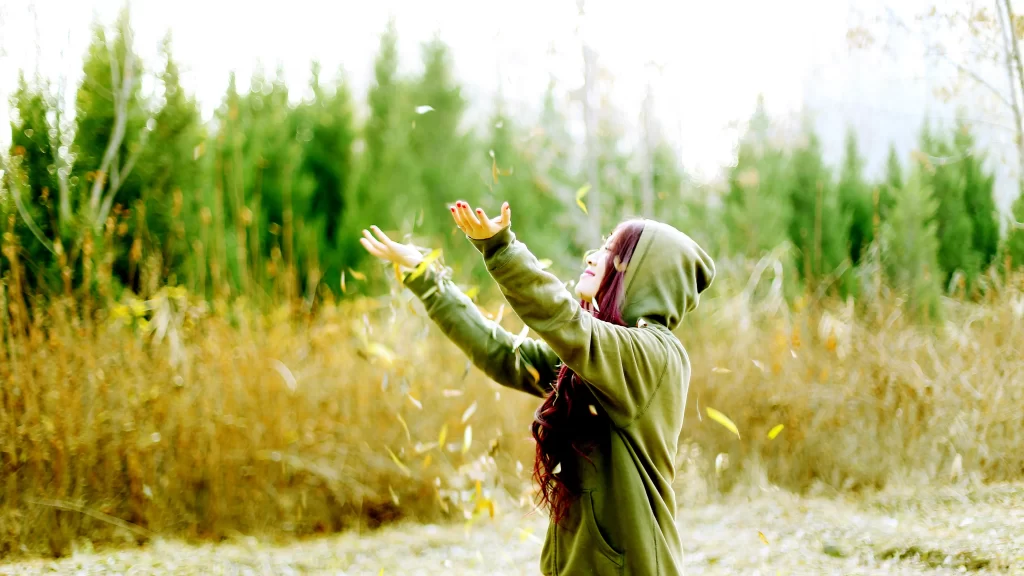 nature woman autumn leaves forest